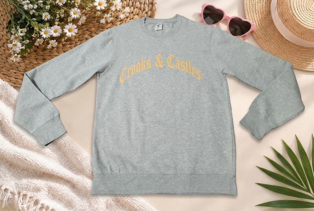 Crooks &amp; Castles Men’s Graphic Crewneck Sweatshirt – Heather Grey with Gold Gothic Script Logo